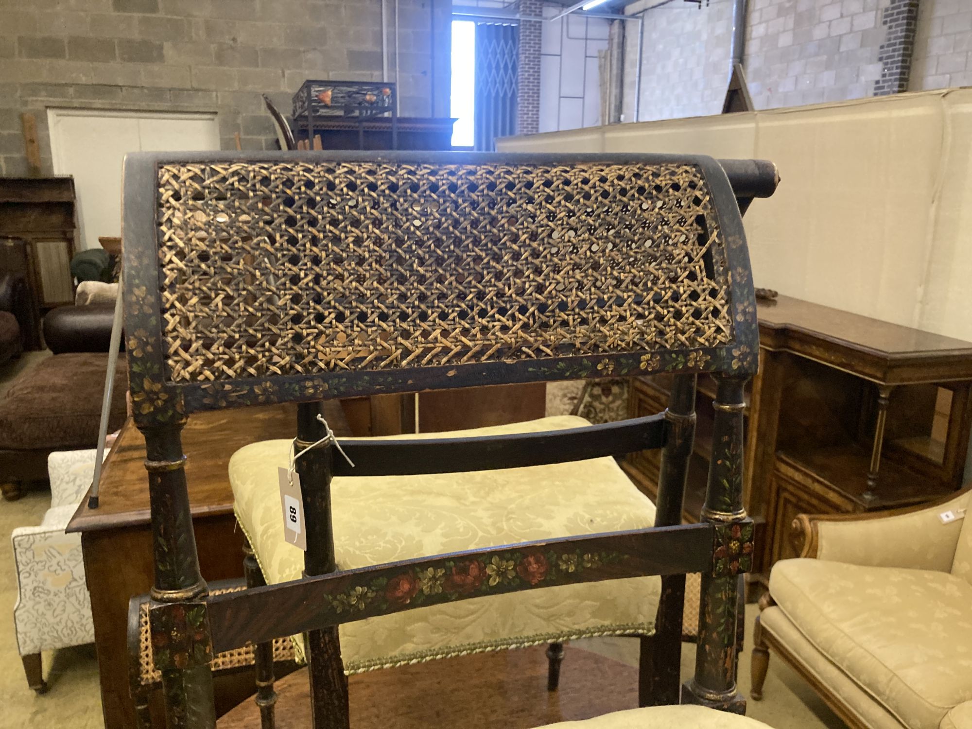 A set of eight Regency painted dining chairs with caned backs, width 50cm, depth 42cm, height 83cm